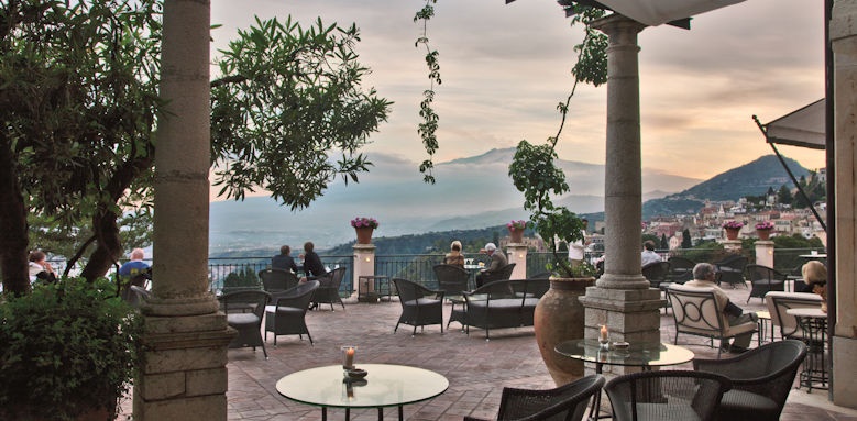 Sunset view from the terrace of the Grand Hotel Timeo to the